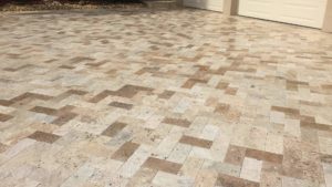 Newly installed travertine driveway