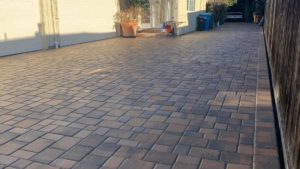 Hardscape Contractor Palm Beach FL Custom front walkway and driveway made from paver stones. Installed at South Florida home