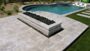 Pool Deck Installation West Palm Beach FL Pool deck constructed from patio pavers in luxury home backyard
